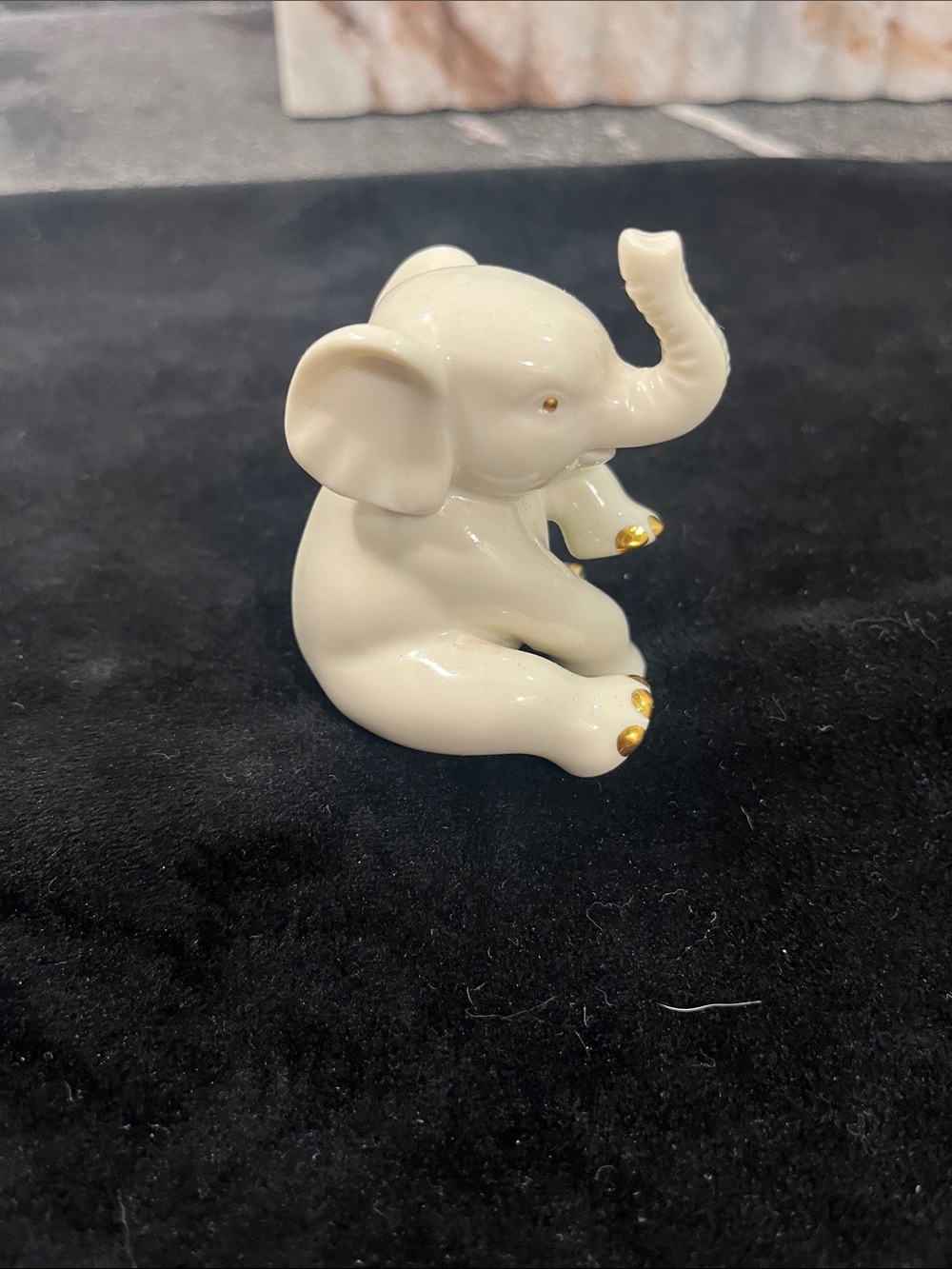 Lenox sitting baby elephant w/ gold metallic detail